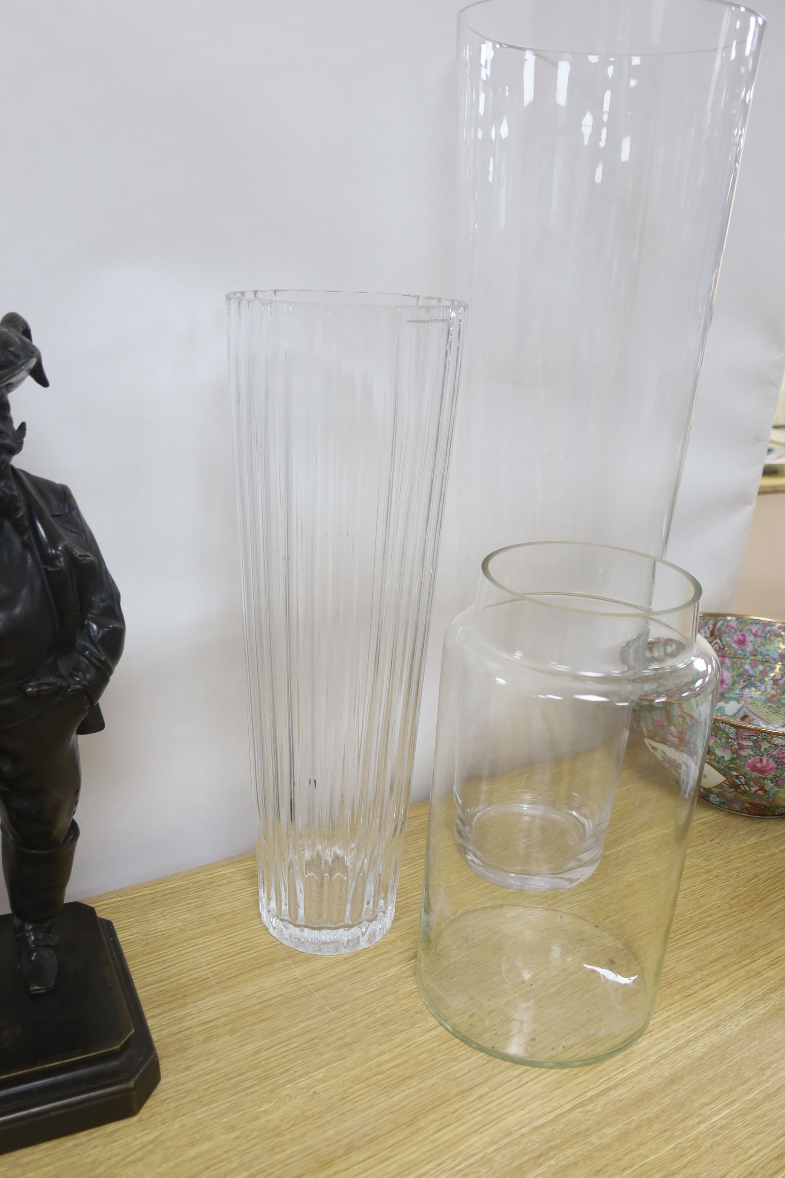Two large flower arranging glass vases and a glass jar 70cm